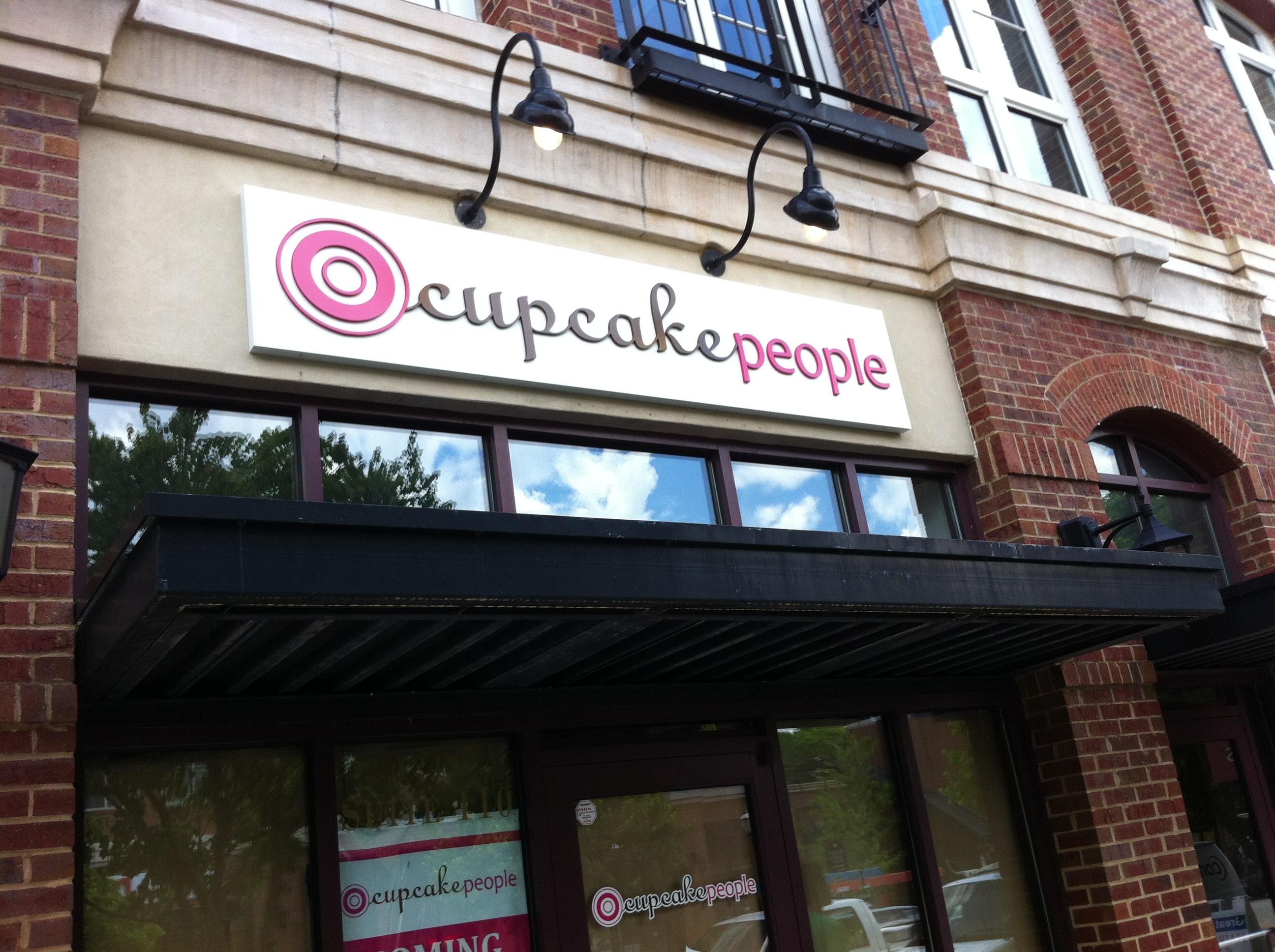 Aluminum pan sign for The Cupcake People